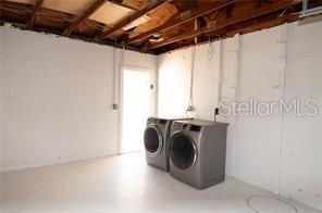 Oversized garage with washer, dryer, garage door opener & loads of room!