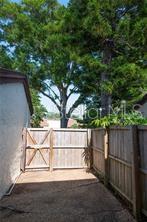 Private gated rear courtyard off dining room