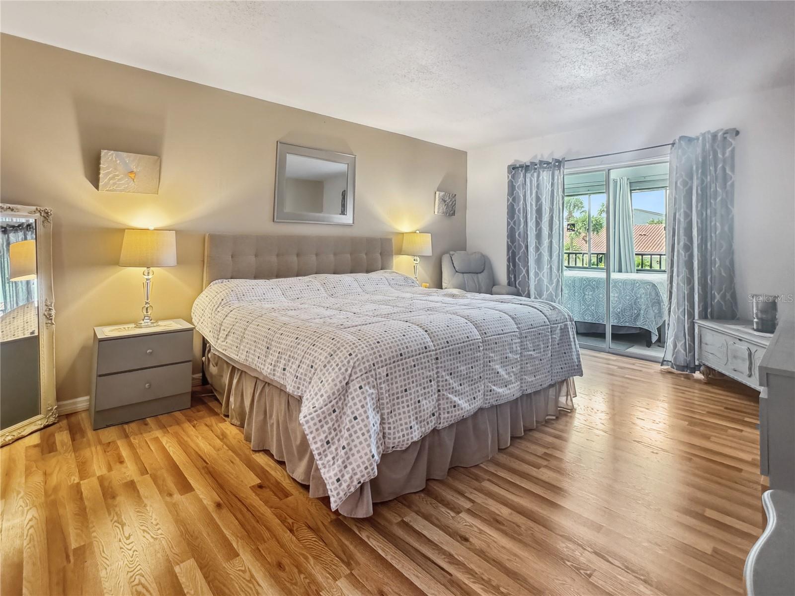 bedroom with sliding doors to lanai