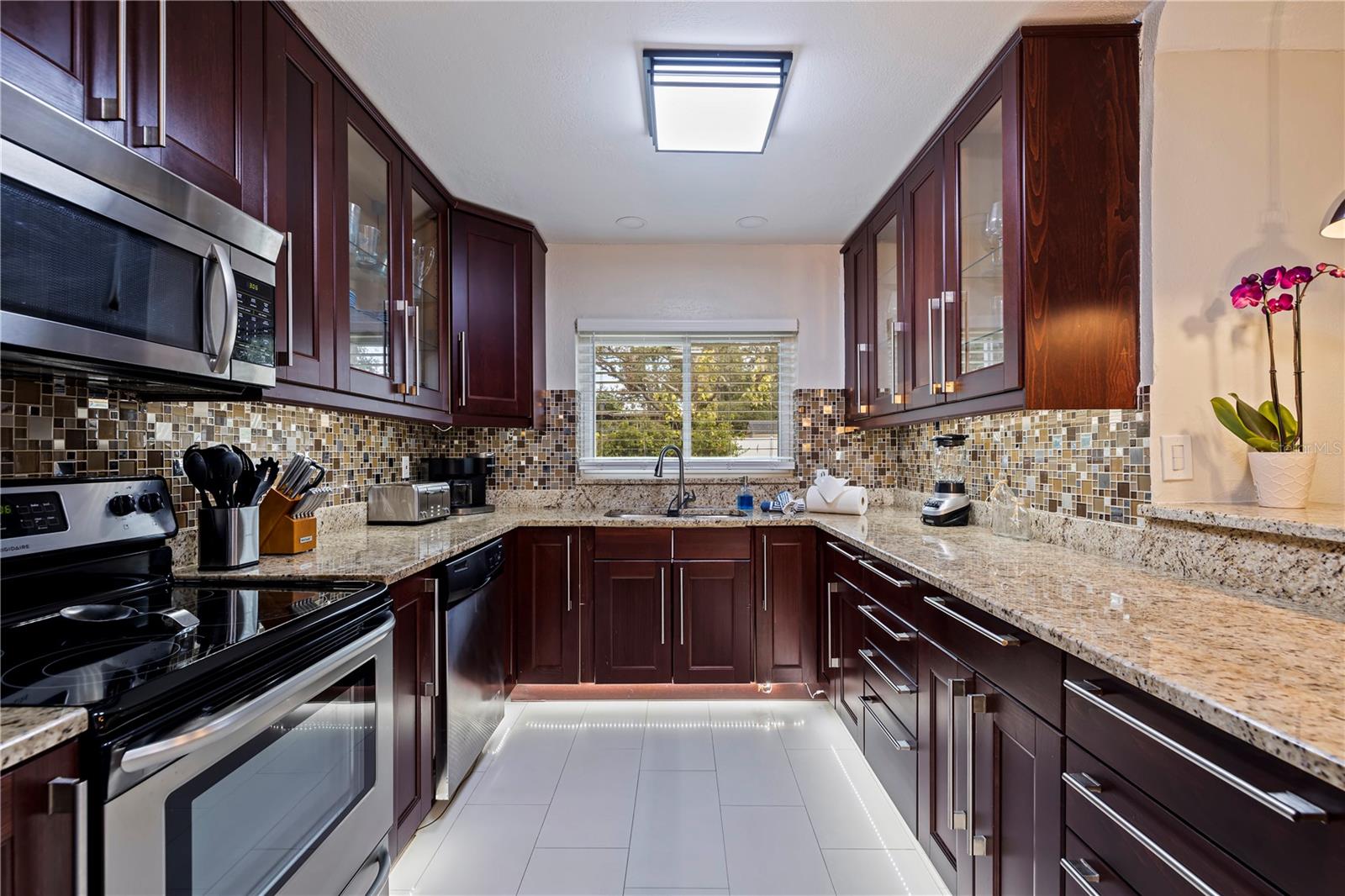 Galley style kitchen, yet large and open.