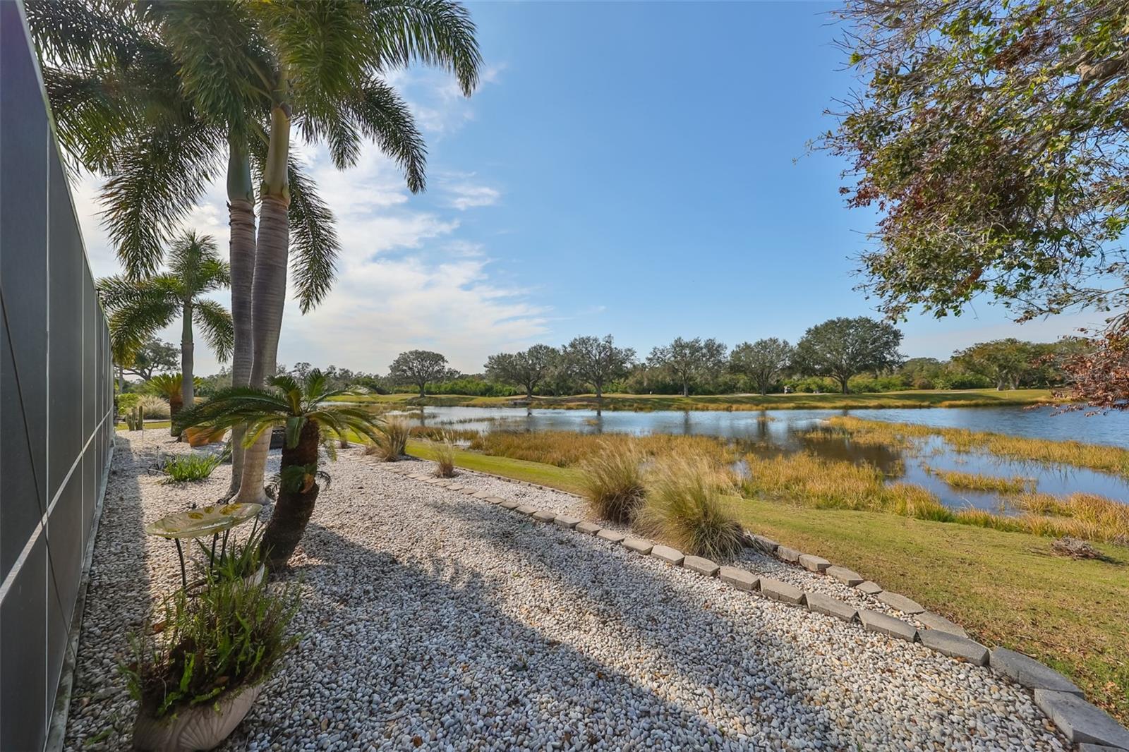 Rear Terraced Yard Pond Renaissance Golf Course View