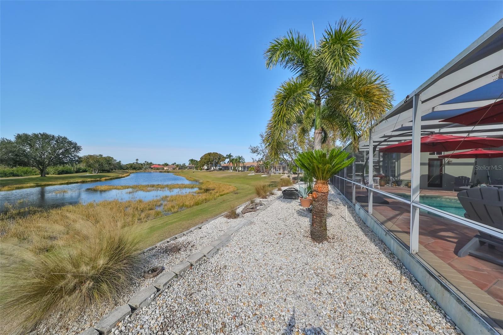 Rear Terraced Yard, Pond Renaissance Golf Course View