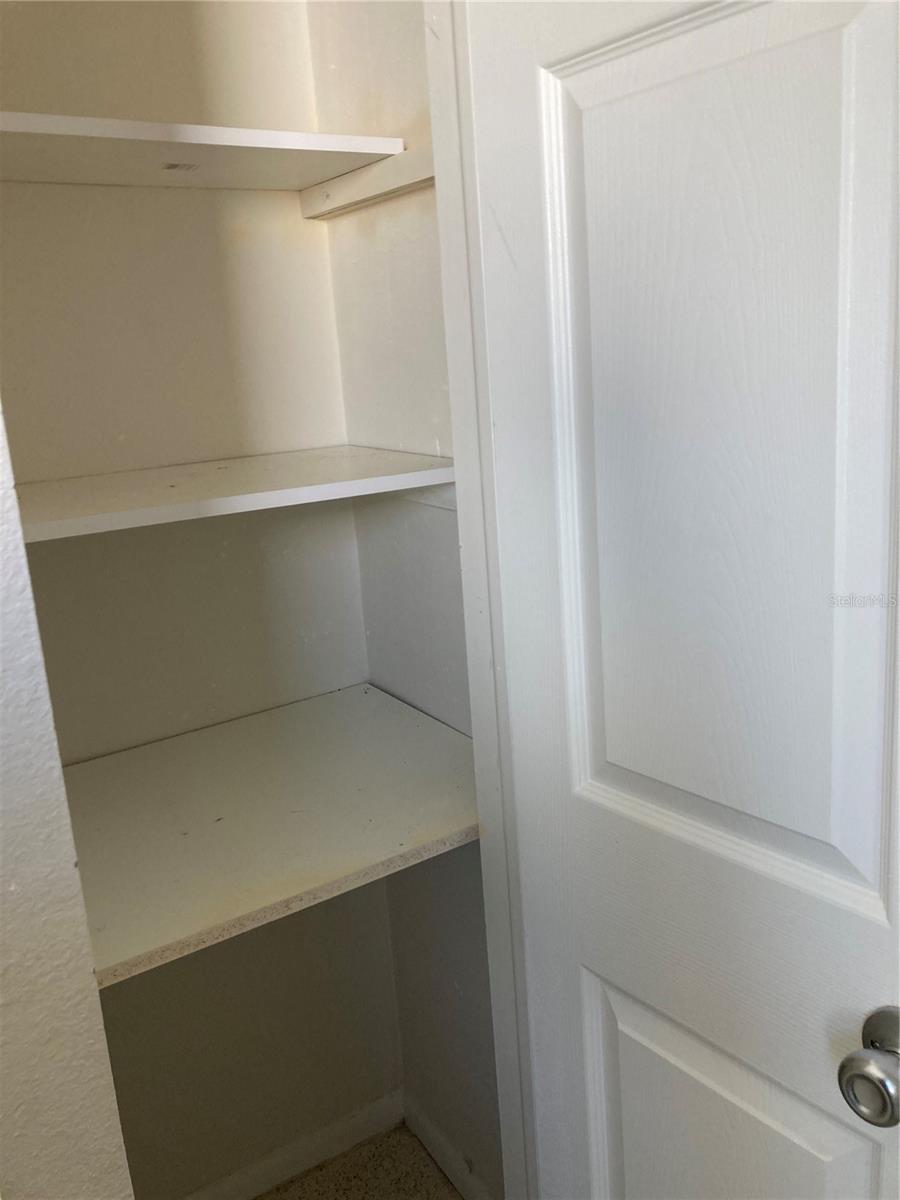 Storage closet in Primary bathroom