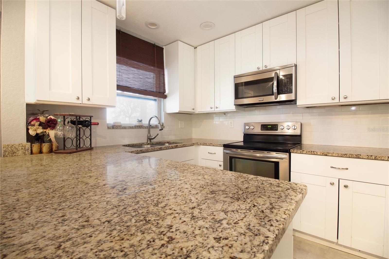 Beautiful granite in the upgraded kitchen.