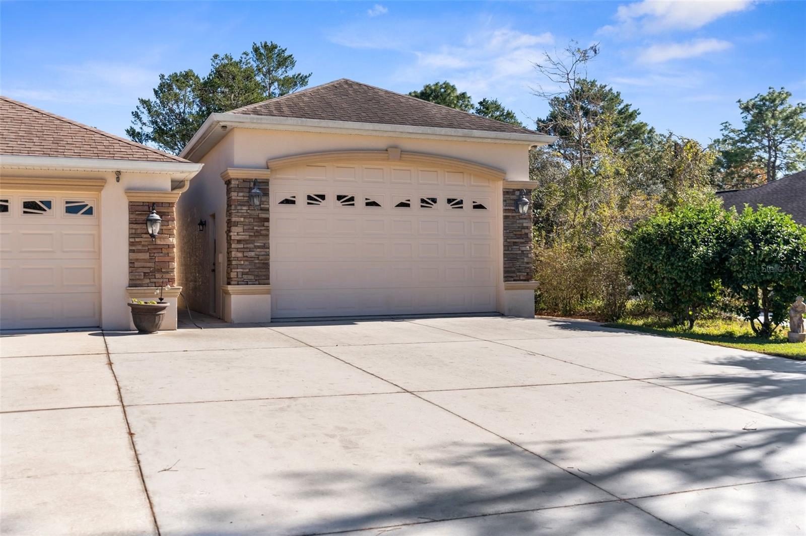 Large detached RV garage (20 x 33 with 10' high door x 20' wide) in addition to the attached 2 car garage.