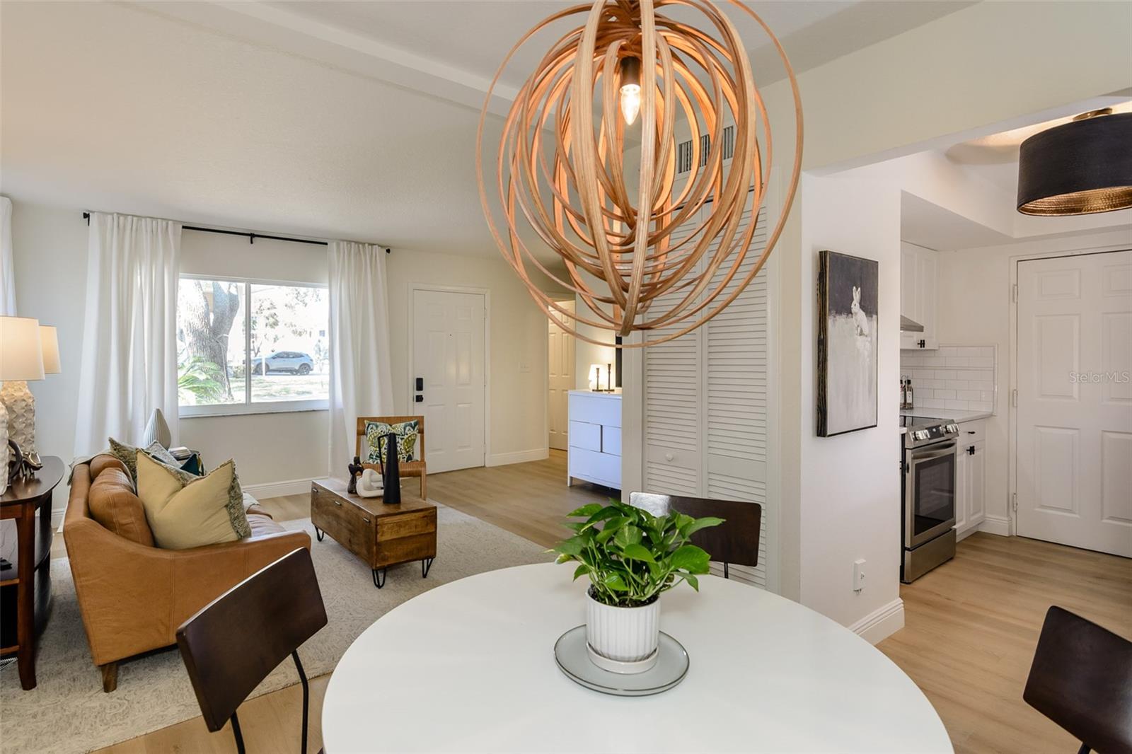 Dining area to Living Room and Kitchen