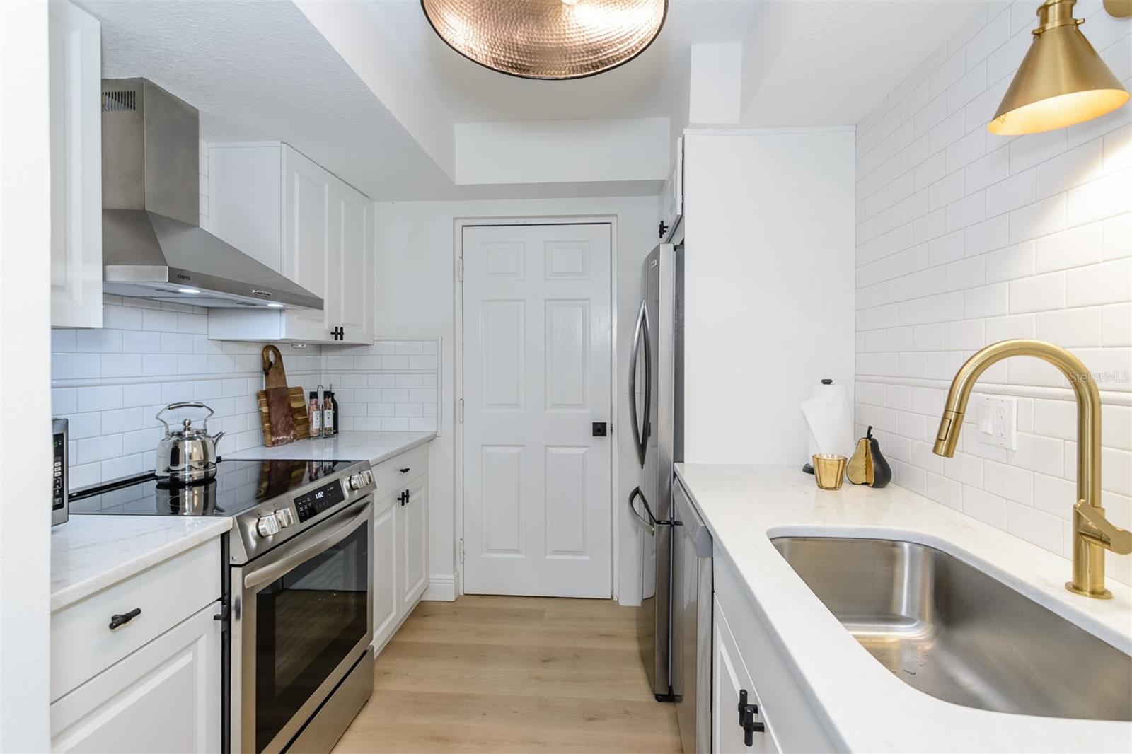 Kitchen with door to garage