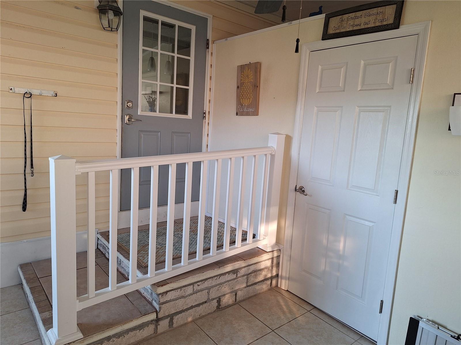 Side Entrance and entrance to storage and laundry room