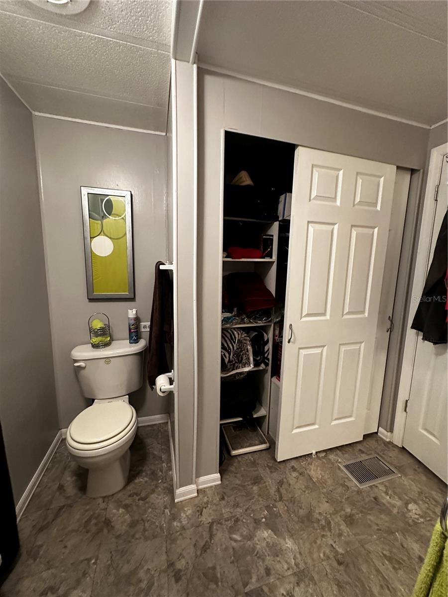 Master bath with large closet