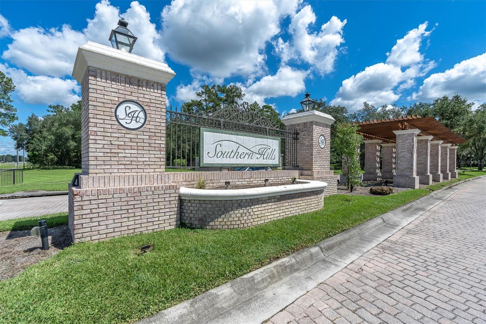 NESTLED IN THE PICTURESQUE GOLF COMMUNITY OF SOTHERN HILLS PLANTATION