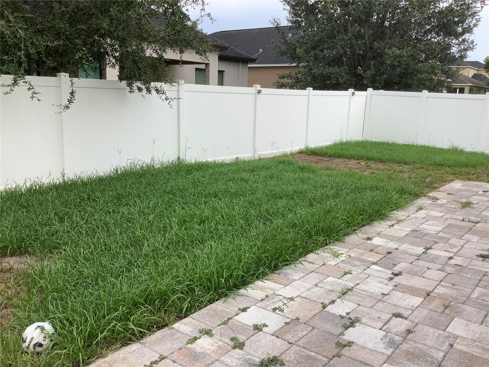 LARGE fenced back and side yard