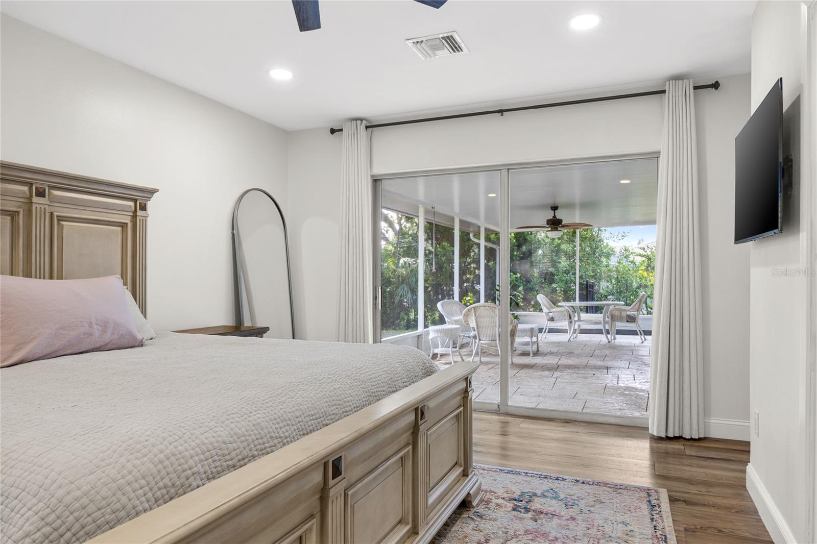 The Primary Bedroom also has sliding doors out to the Lanai