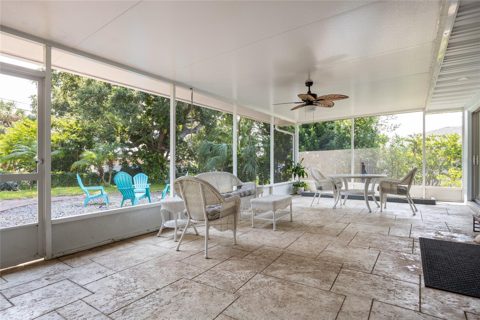 This screened and covered Lanai is HUGE and adds an additional 400 square feet of covered area!