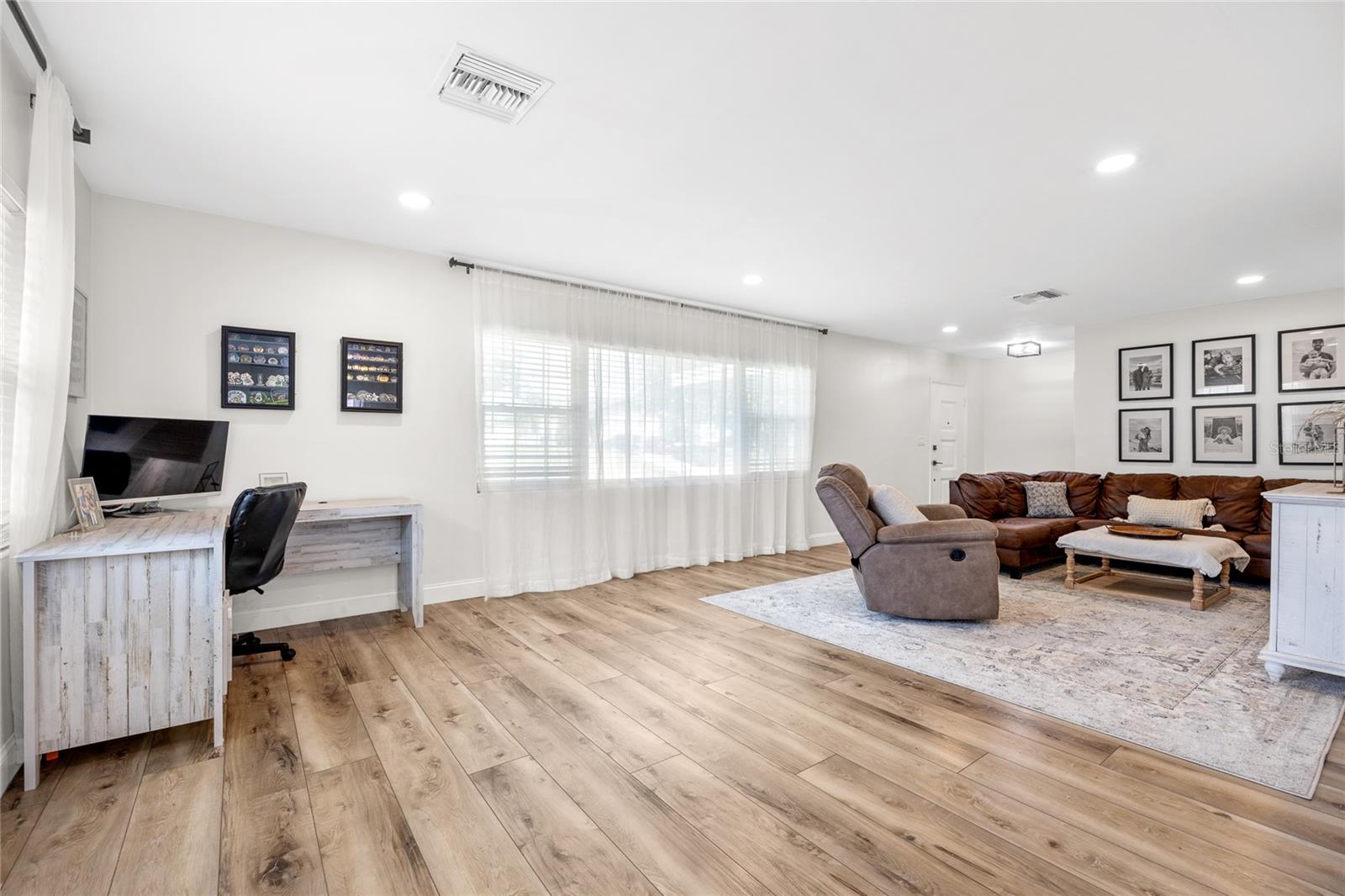 This view shows the large window at the front of the house that lets in wonderful natural light!