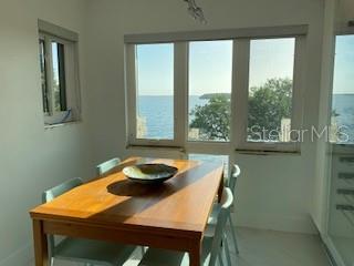 Dining room with direct water views