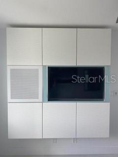 Primary bedroom custom wall cabinet