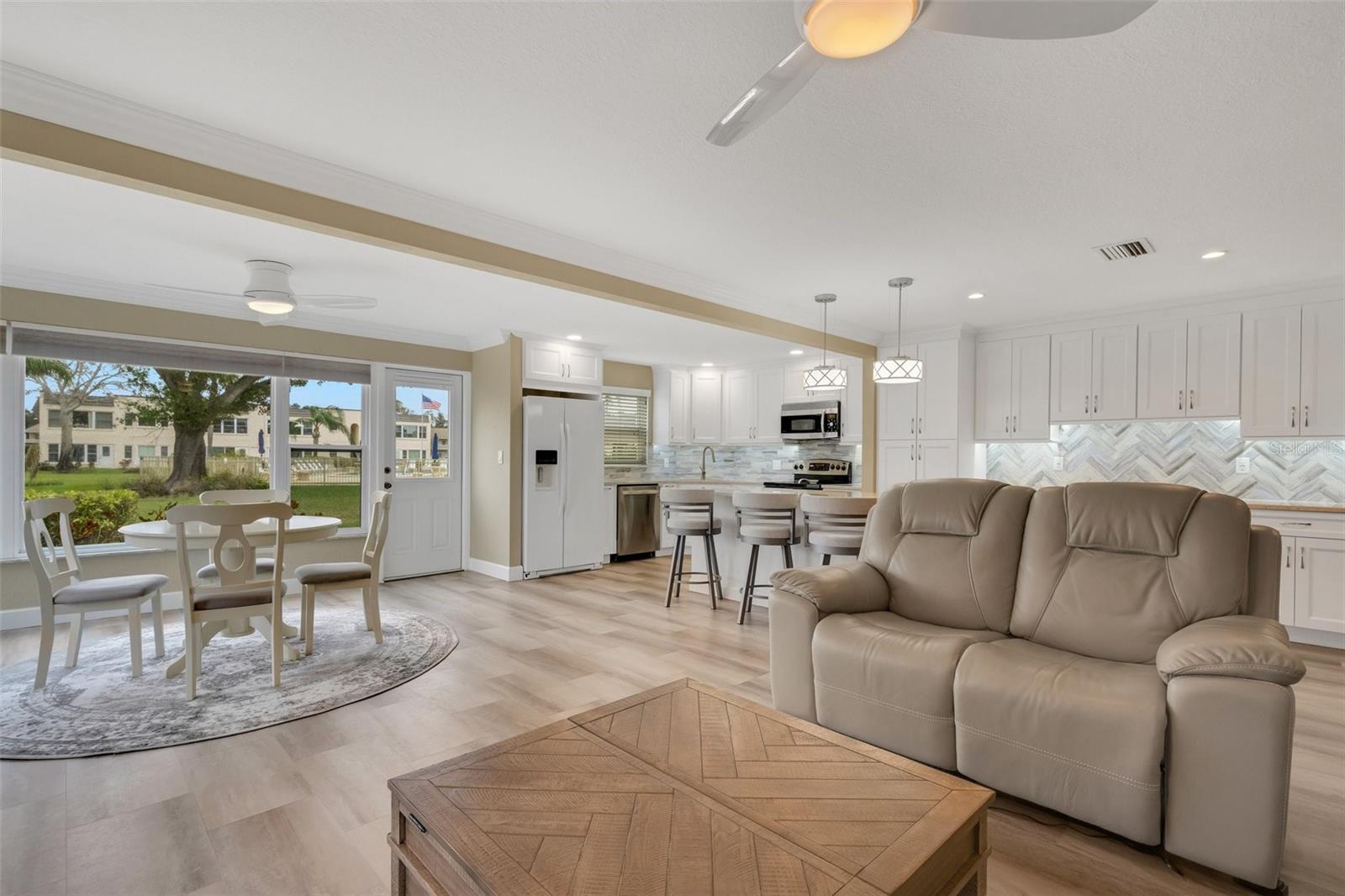 Living Room Looking to Kitchen and Florida Room.