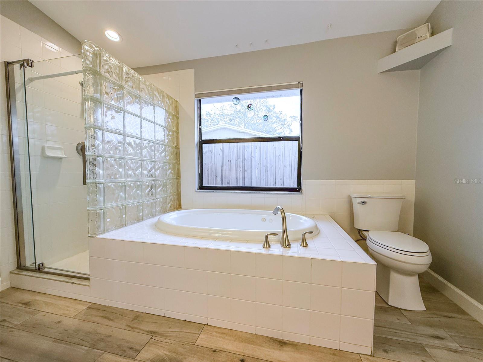 Soaking tub and sizable shower