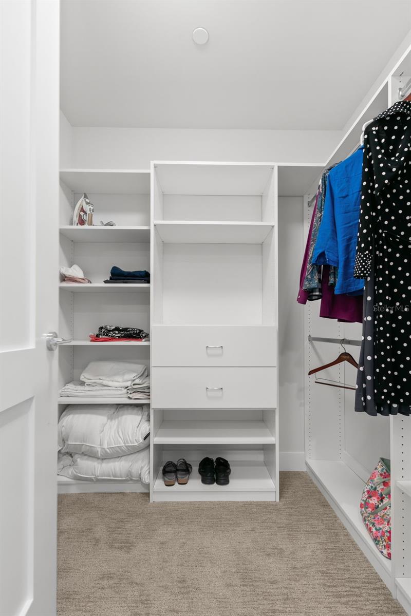 Master walk in closet, one of two