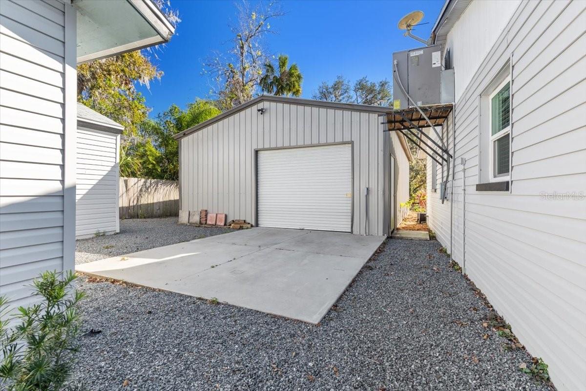 Detached garage with 2 bay doors at opposite ends