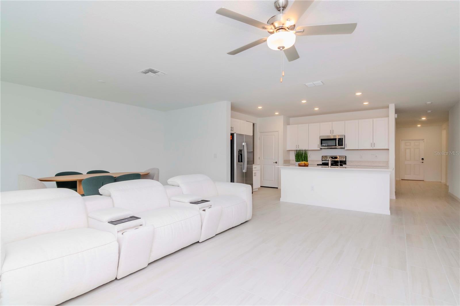 Spacious Open Concept Living Room Dining Room and Kitchen