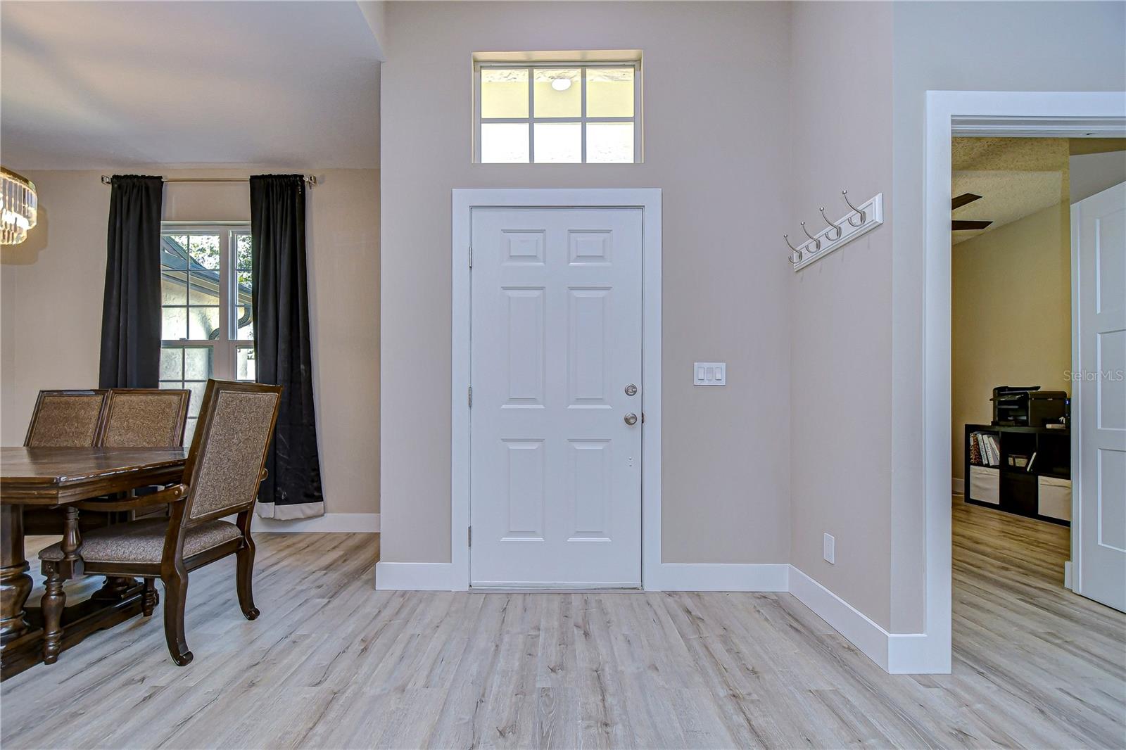 Walk through the front door and you are greeted with an open, bright foyer!