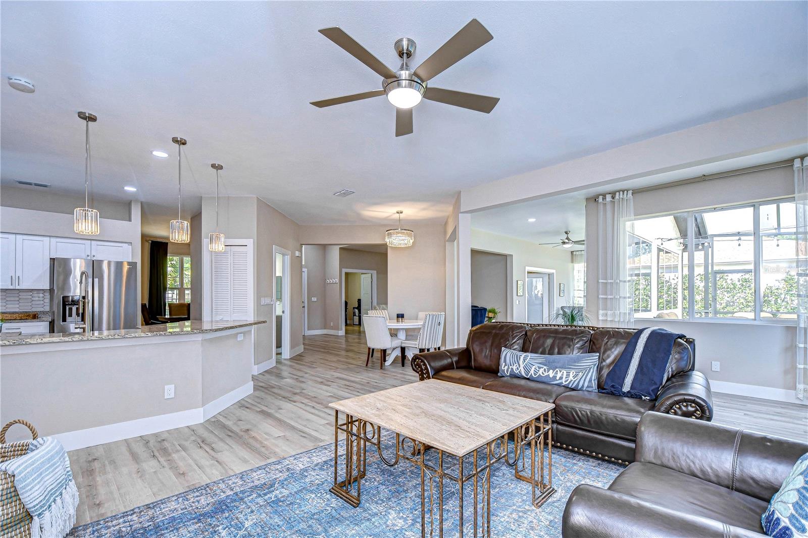 The great room opens up to the kitchen and additional dining area!