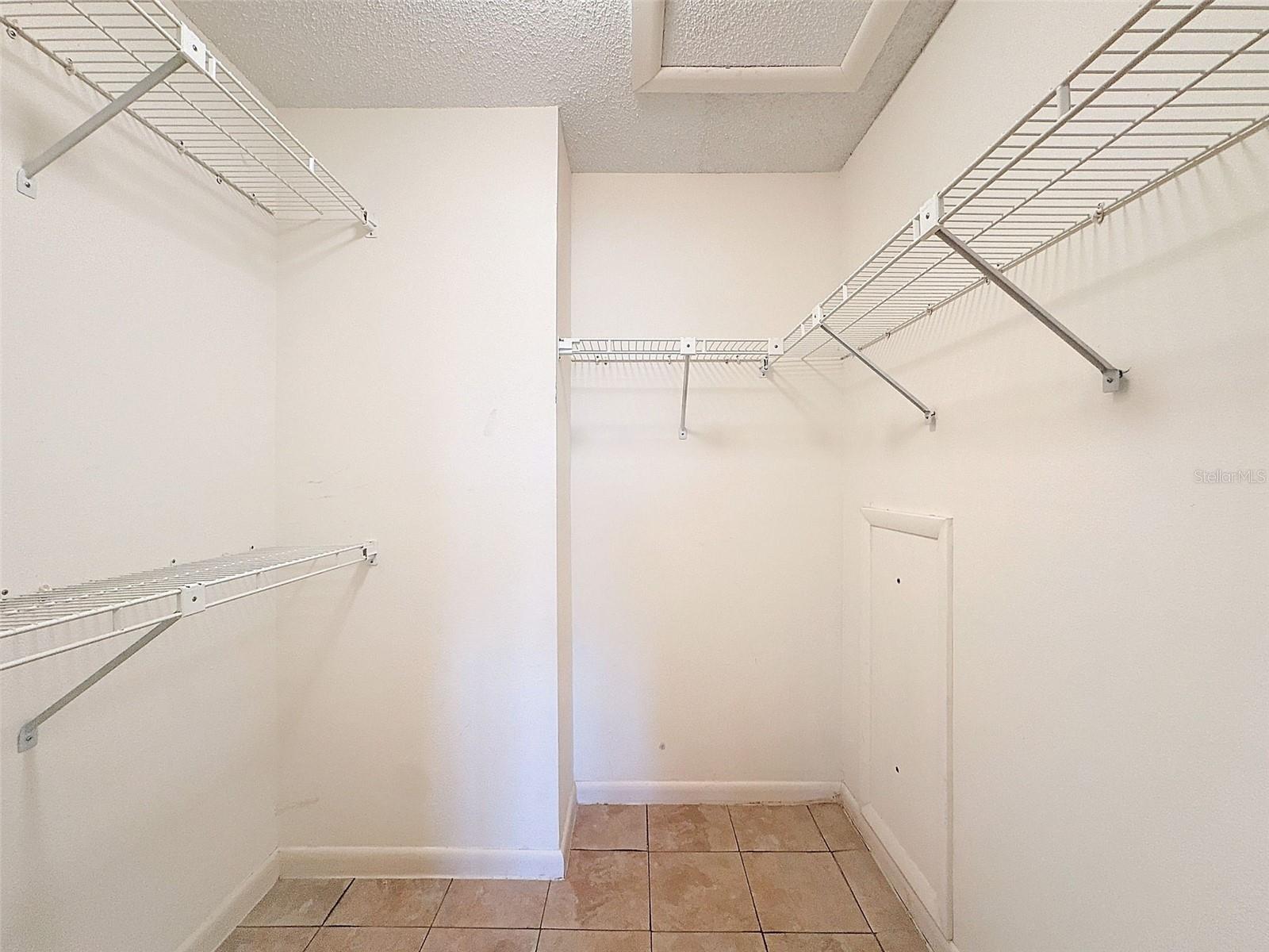 Primary Bedroom En-Suite Walk-in Closet