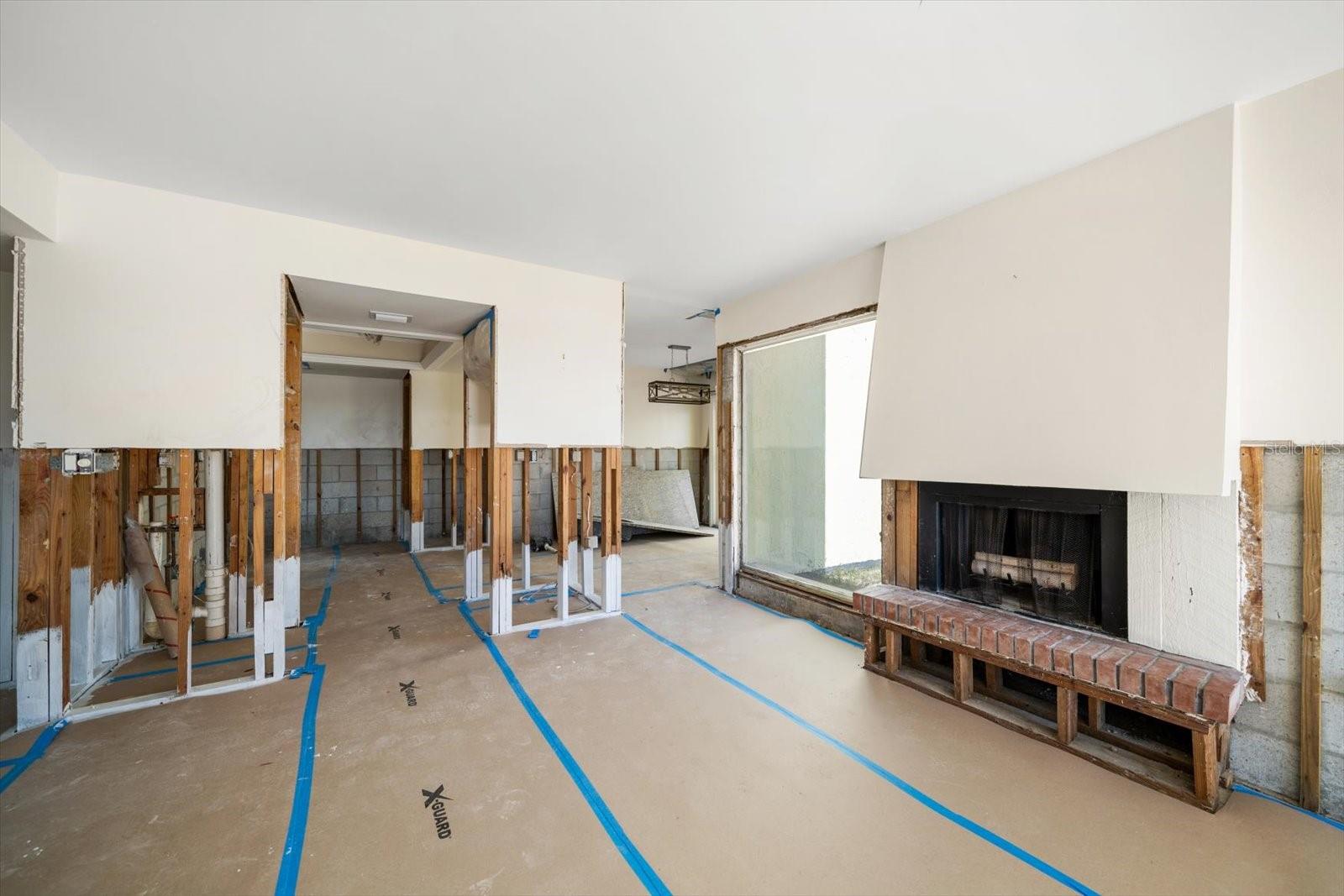 LIVING ROOM TO KITCHEN DURING REMEDIATION