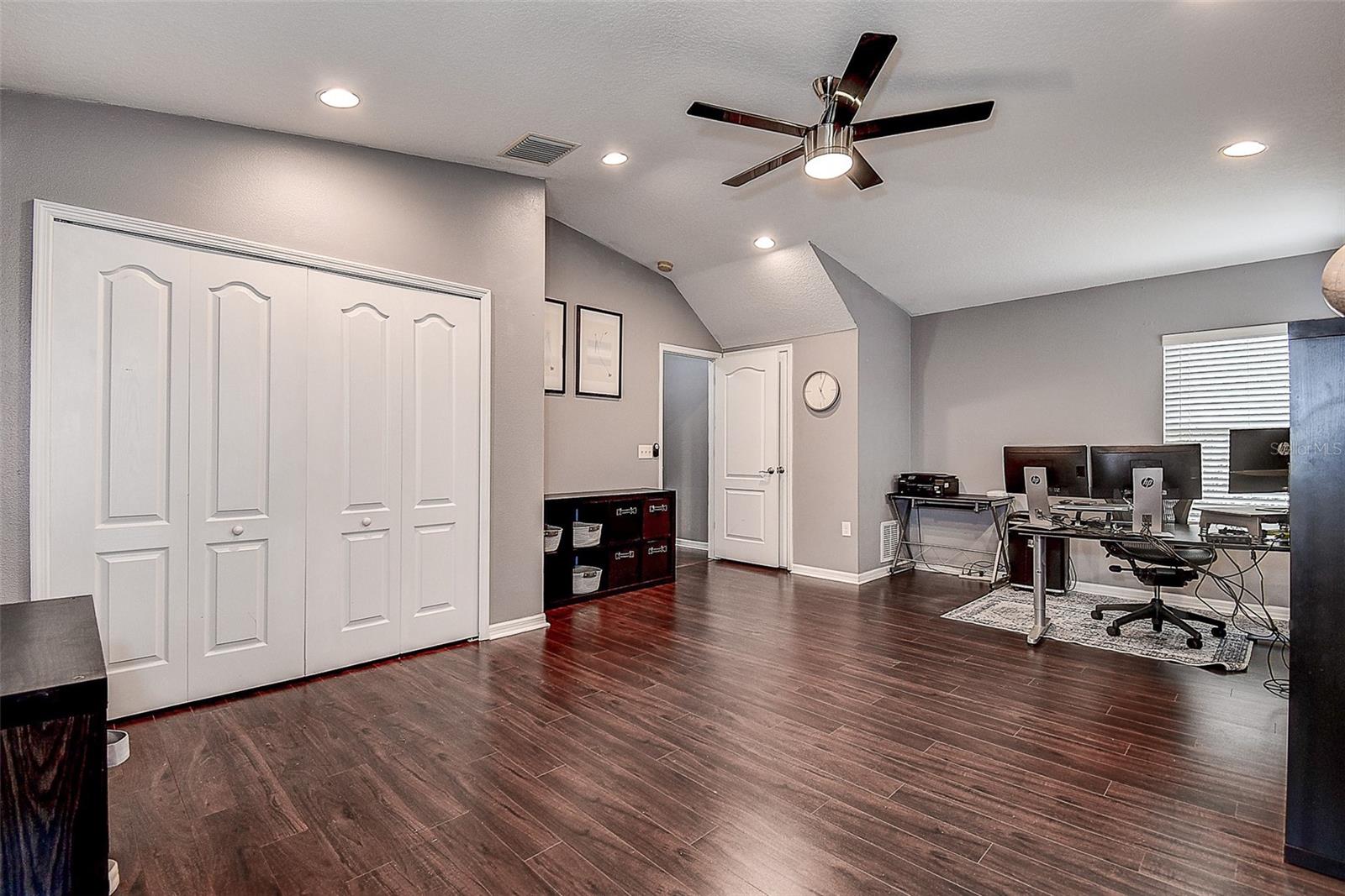 Large custom closet in Bedroom 4 along with a smaller closet behind the door.