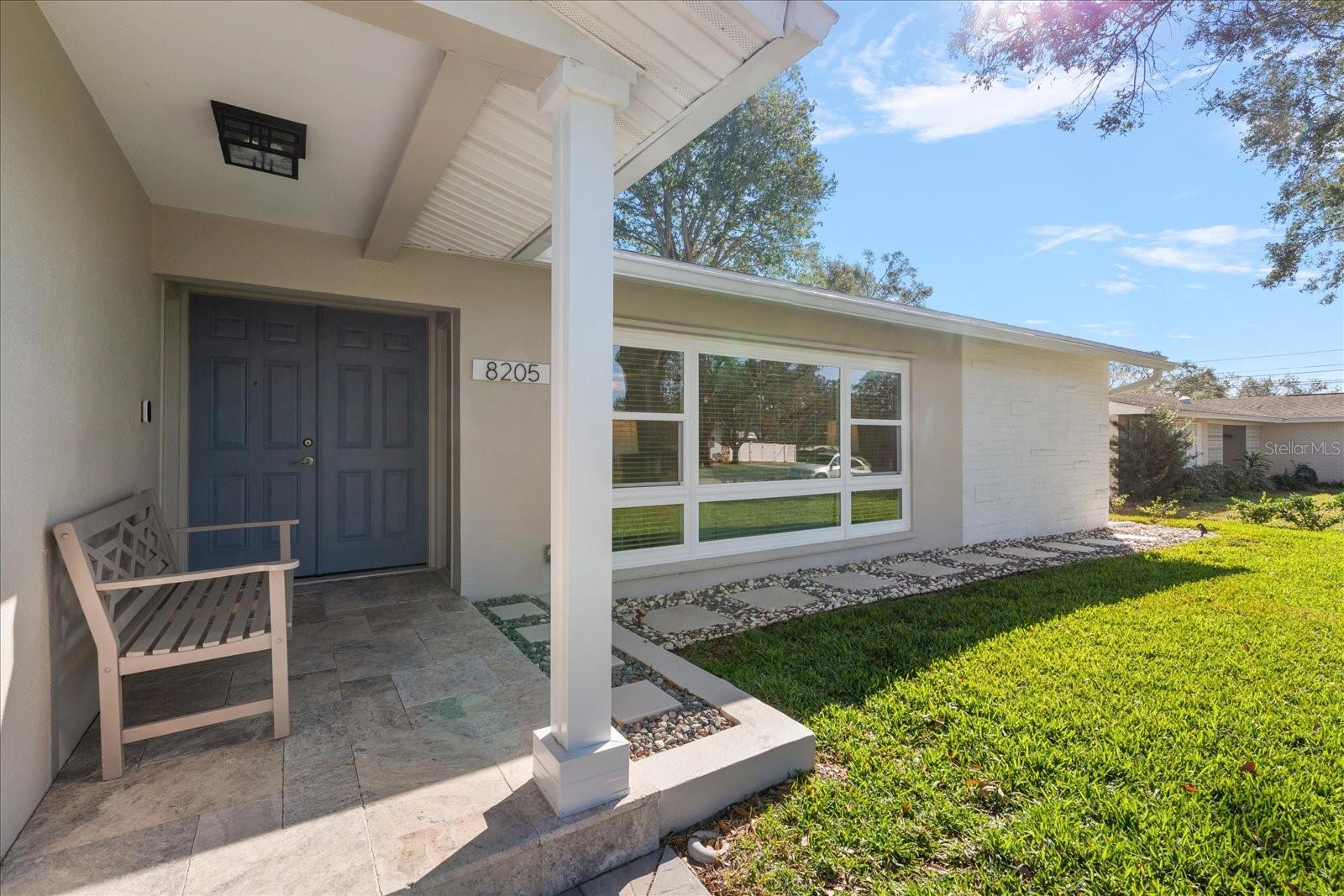 Walking up to the entrance of the home.