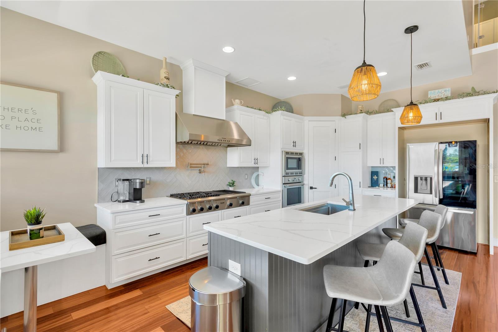 Kitchen View! Notice The Decorative Bead Board Wrap Around The Island, With The Appealing Pendant Lighting!