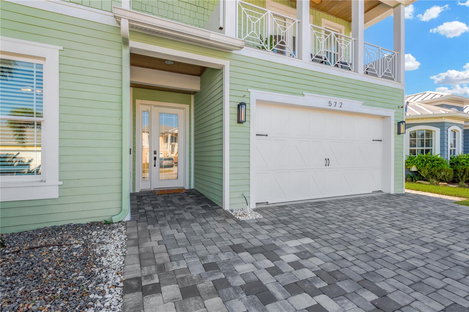 Expanded Paver Drive, Hardi-Board Finish, Front Balcony, and Welcoming 8ft Entry Door!