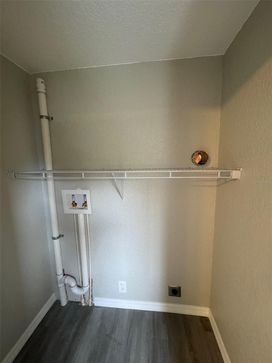 Laundry closet and 2nd bedroom