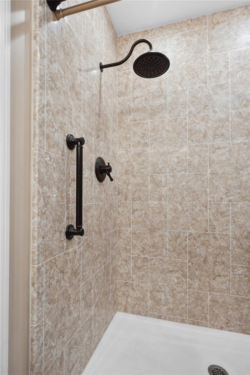 Primary bath has walk-in shower