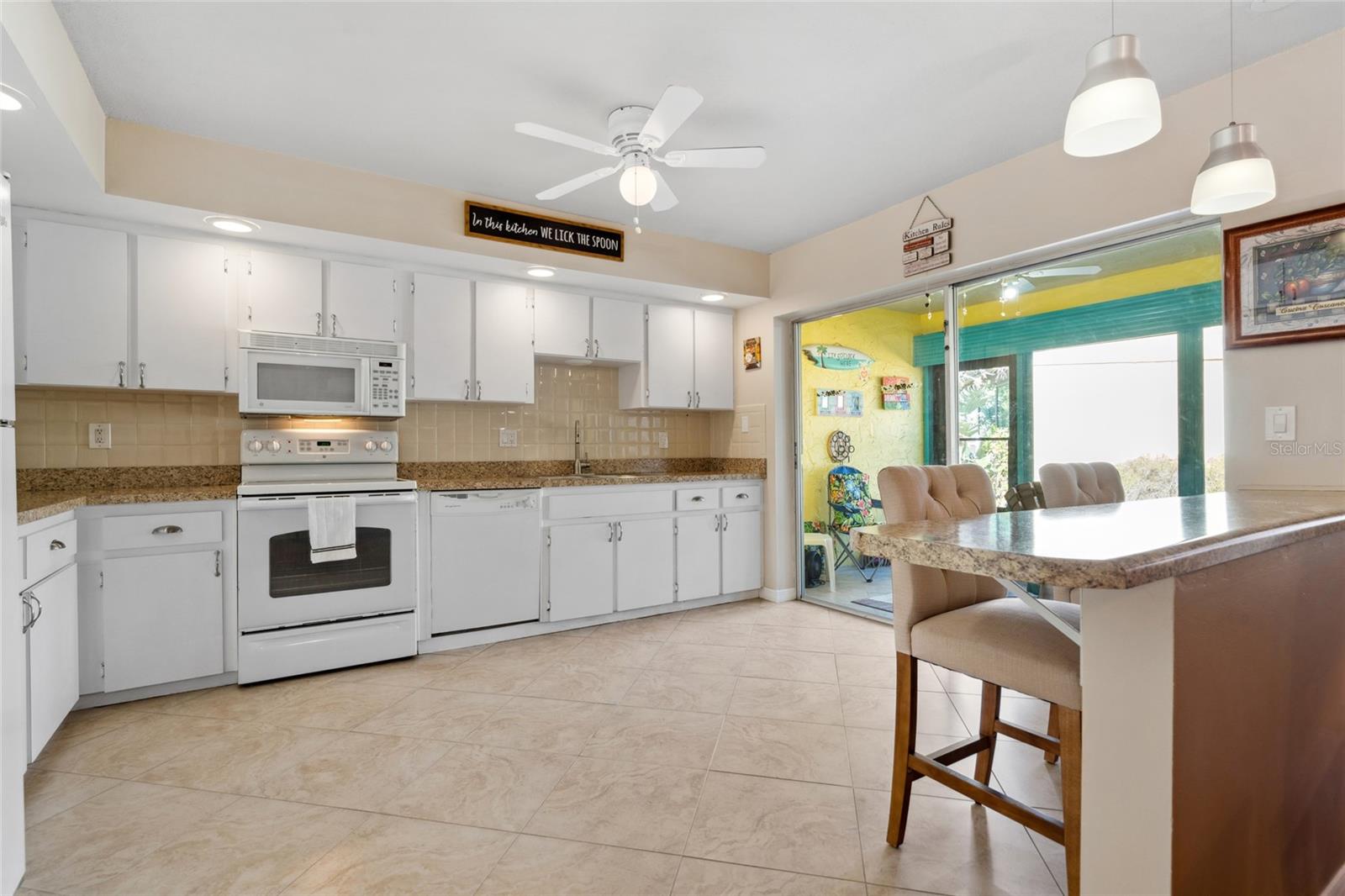 Breakfast bar between the kitchen and family