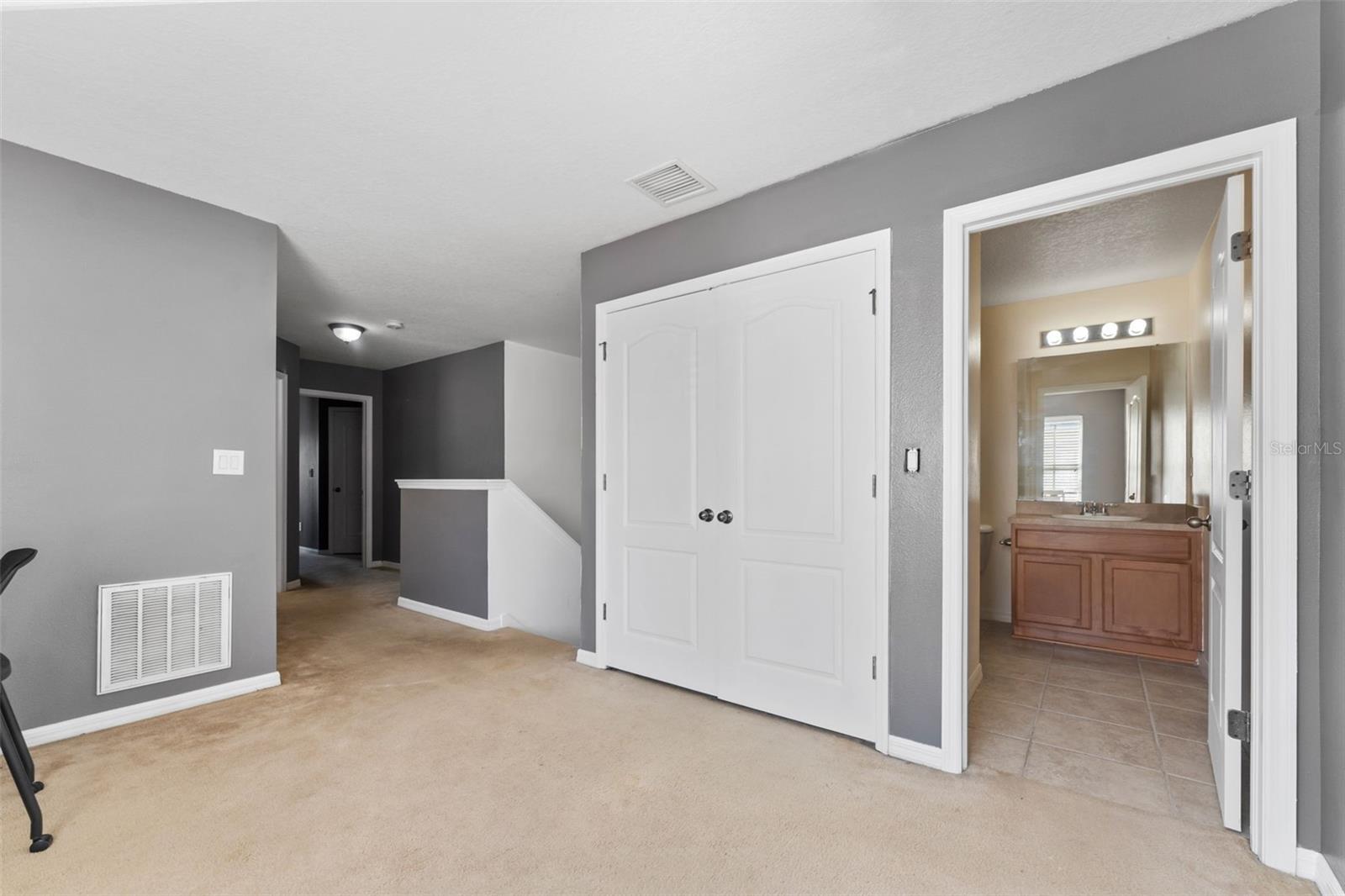 2nd Floor Hallway With 2nd Bathroom In View