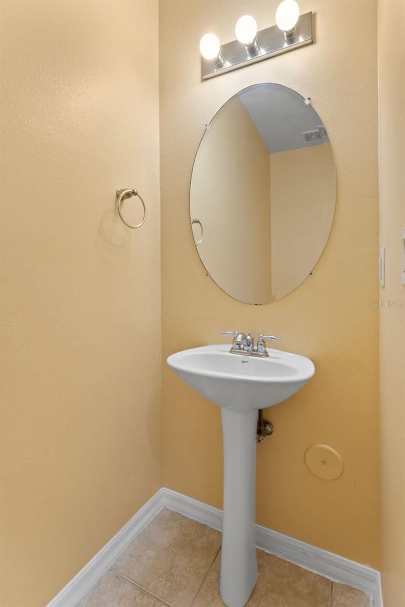 1st Floor Guest Bathroom With Pedestal Sink