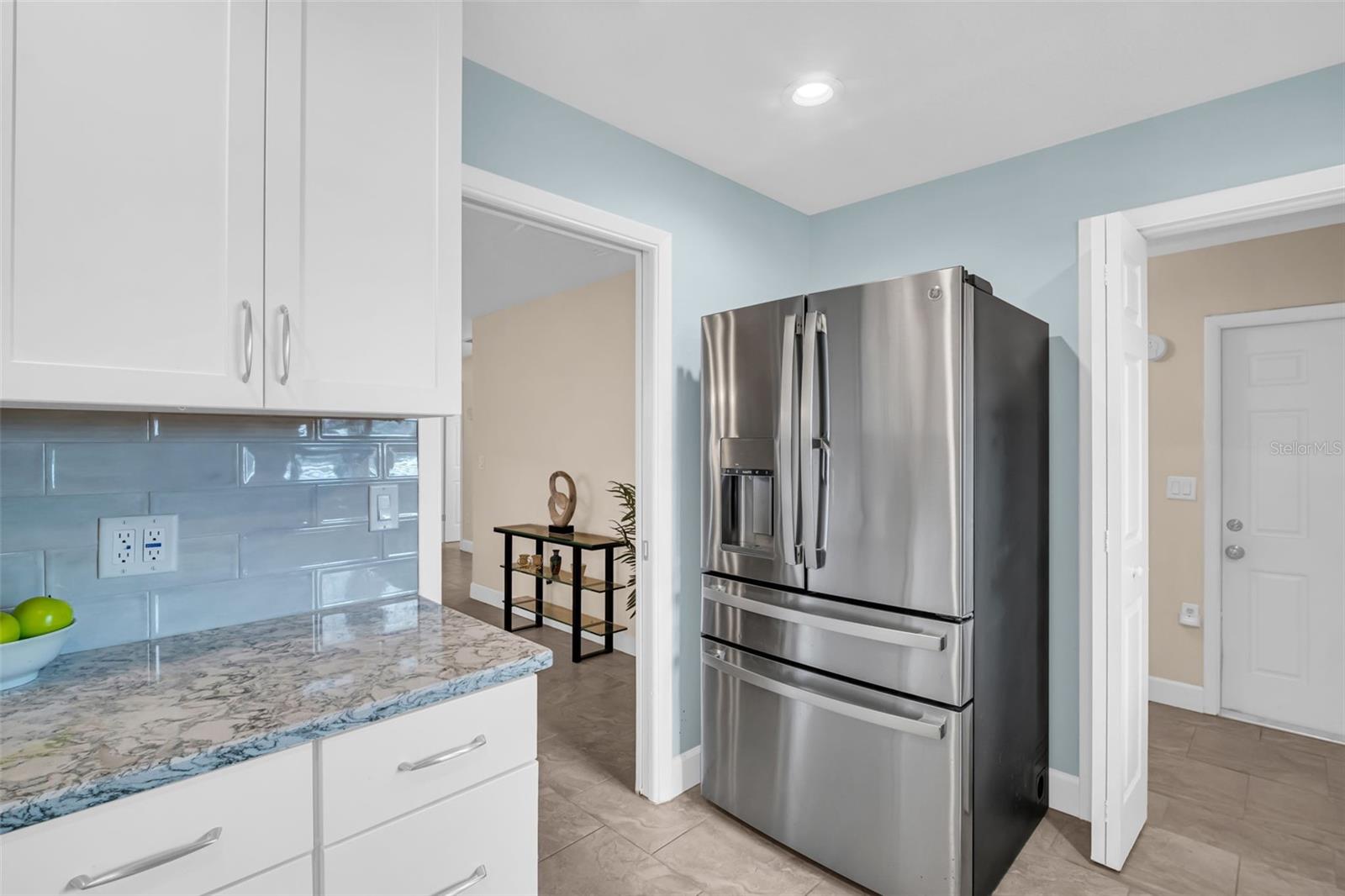 Laundry room & pantry closets adjacent to kitchen~