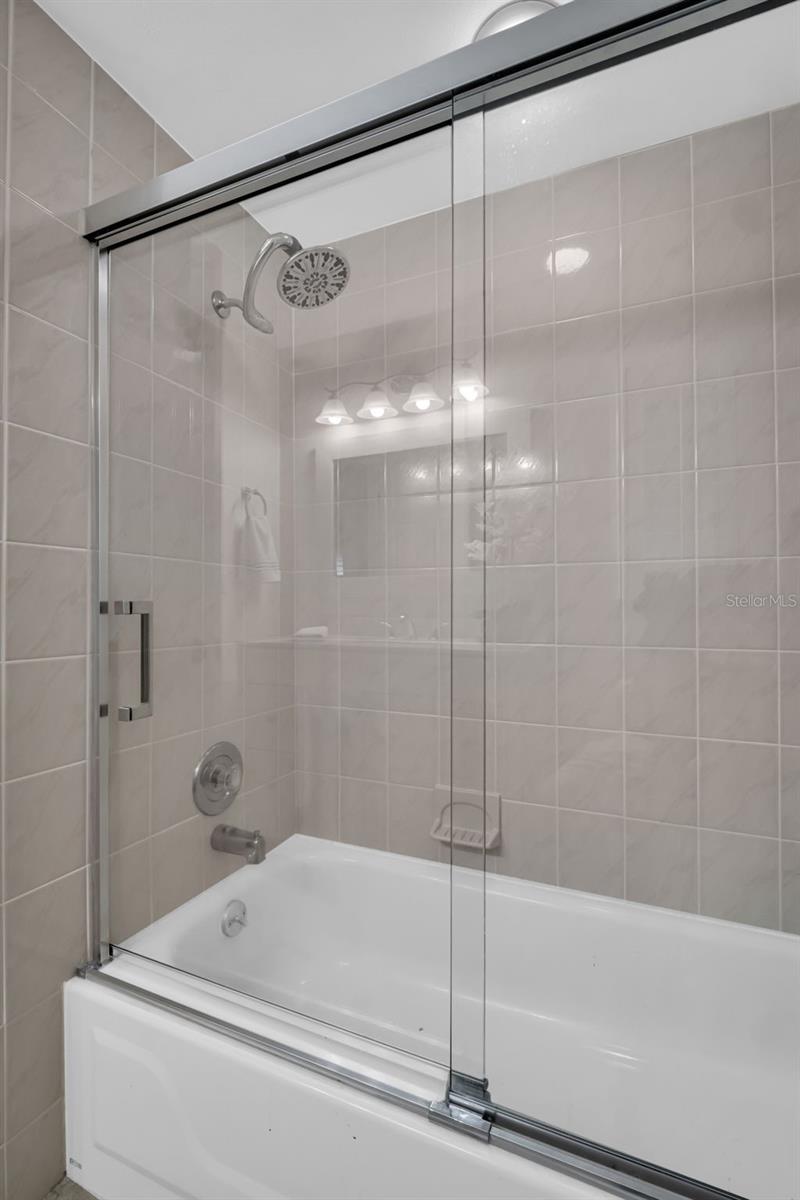 Tub/shower with sturdy glass doors~