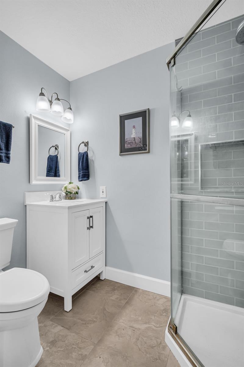 Updated second bathroom with tile & sturdy glass shower~