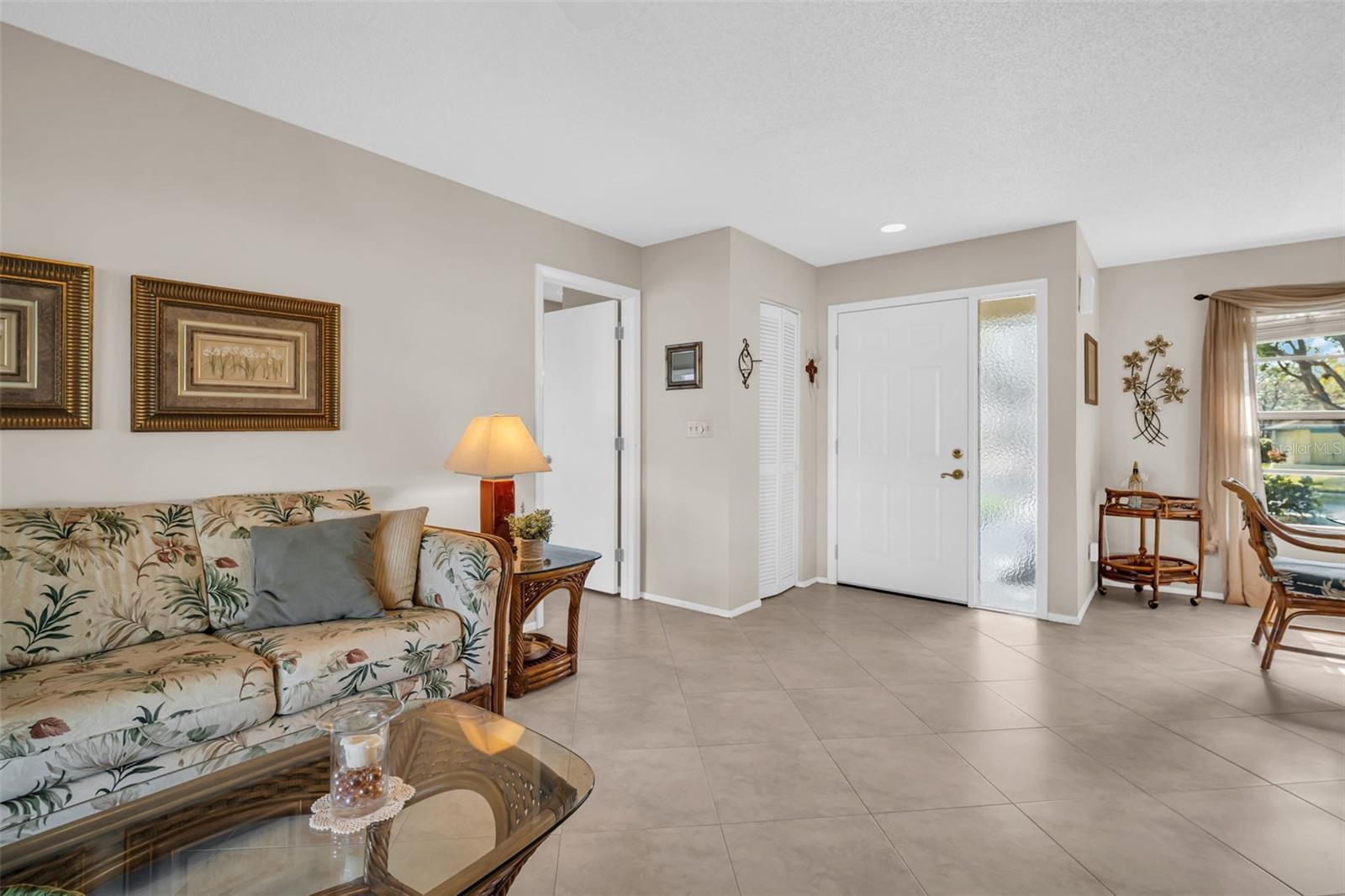 Updated light neutral tile flooring~