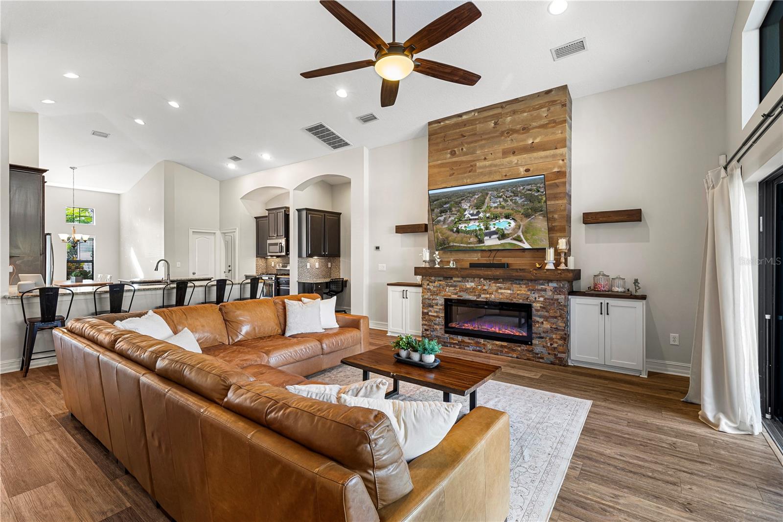 Custom Feature Wall w/fireplace & built-in shelves and cabinets