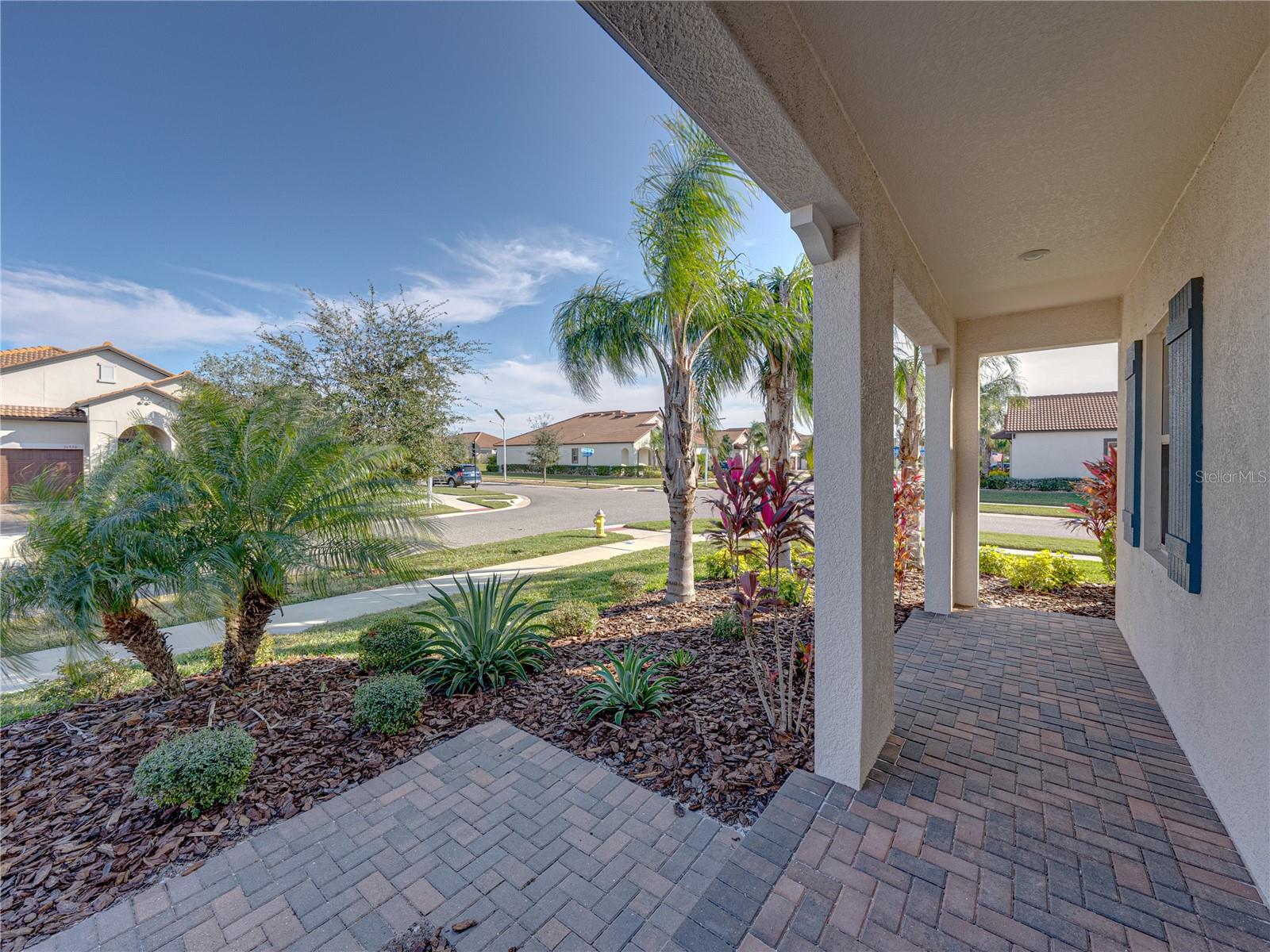 Beautiful front porch, ideal for enjoying your coffee and saying Good Morning to your neighbors