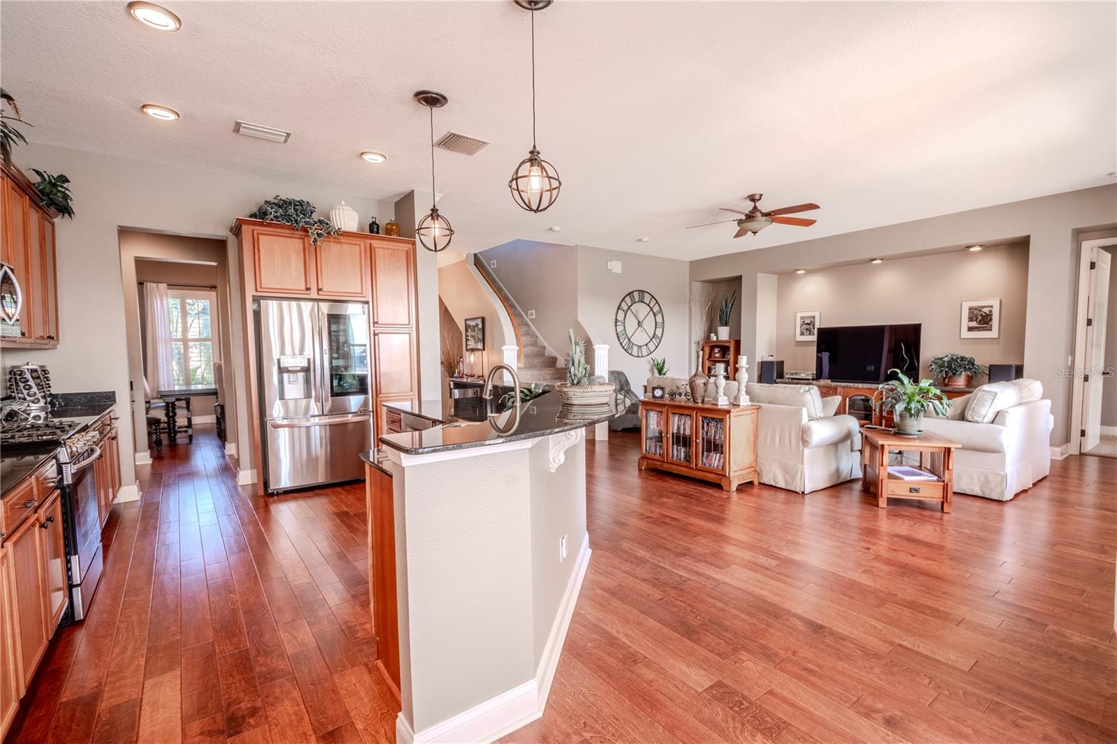 The kitchen is open to the family and dining rooms for effortless entertaining.