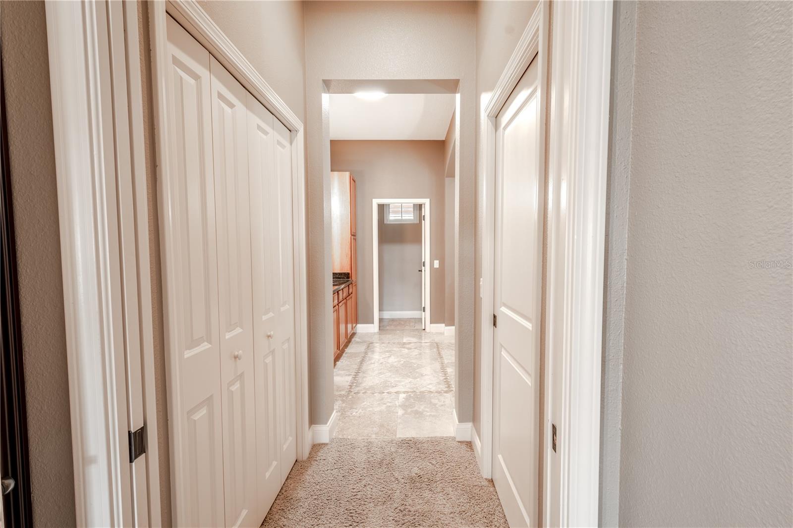 The primary bedroom boasts dual closets (one is a walk-in)