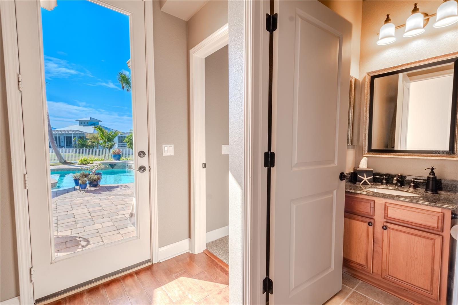 Rear door to the pool and patio.