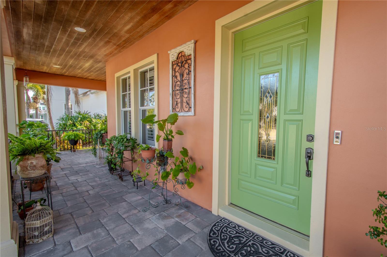 8-panel front door with beveled glass.