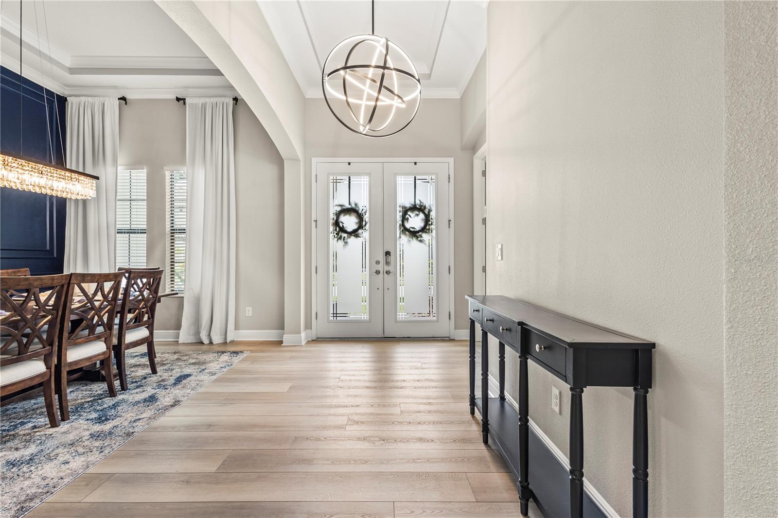 Entryway and Formal Dining; Luxury Vinyl Plank throughout first floor