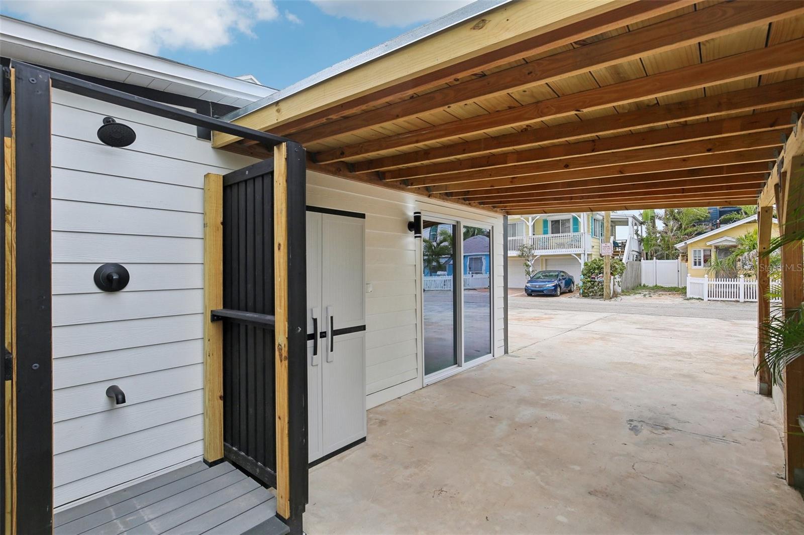 Outside shower and storage closet.